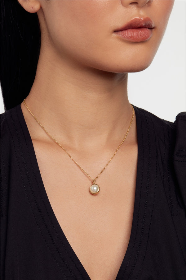 Perreti Gold Tone Pearl Orbit Necklace