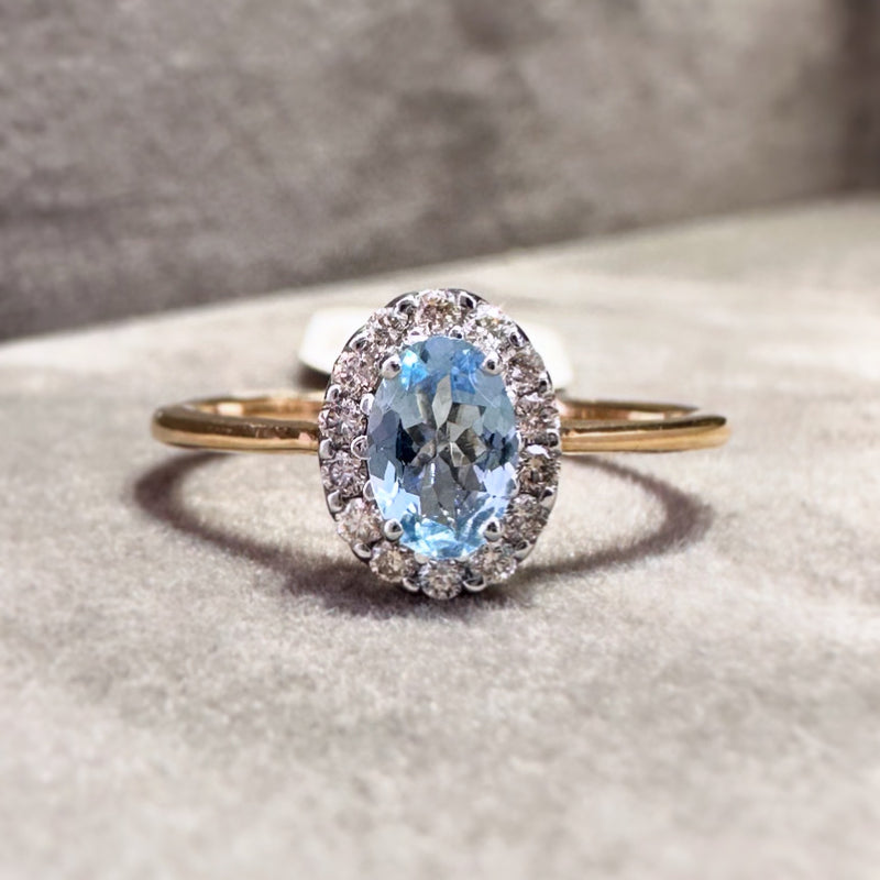 Oval Aquamarine and Diamond Halo