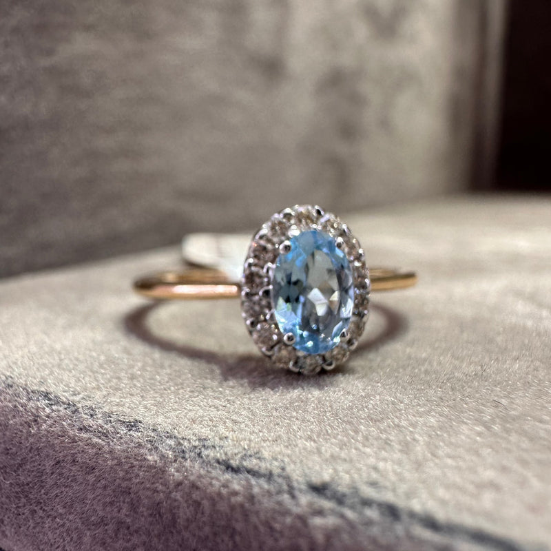 Oval Aquamarine and Diamond Halo