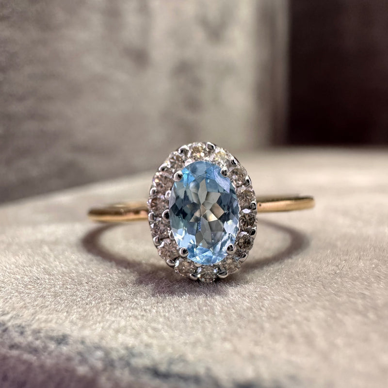 Oval Aquamarine and Diamond Halo