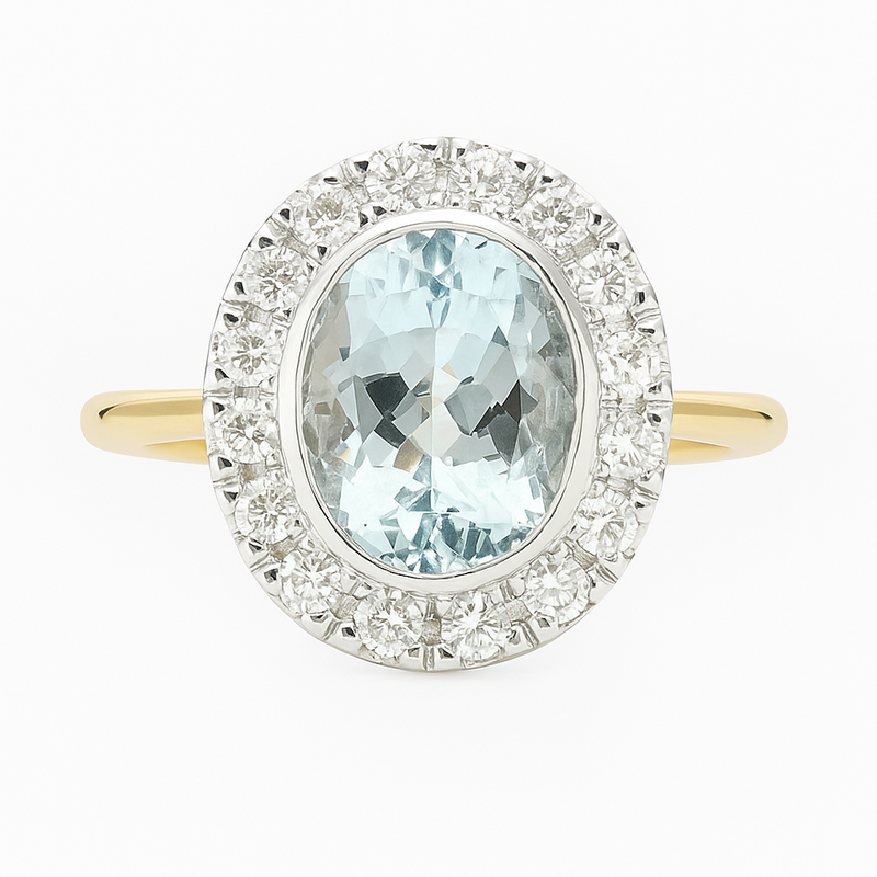 Ring with a blue gemstone and diamond-studded halo on a white background